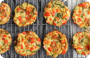 Plate of soft veggie egg muffins, ready to serve for breakfast.  Ensure the image styling (aspect ratio, overlay if used) matches the other tiles.