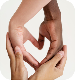 Close-up of diverse hands gently holding each other, symbolising support and solidarity for people living with Myasthenia Gravis