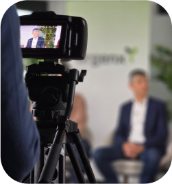 Close-up of diverse hands gently holding each other, symbolising support and solidarity for people living with Myasthenia Gravis