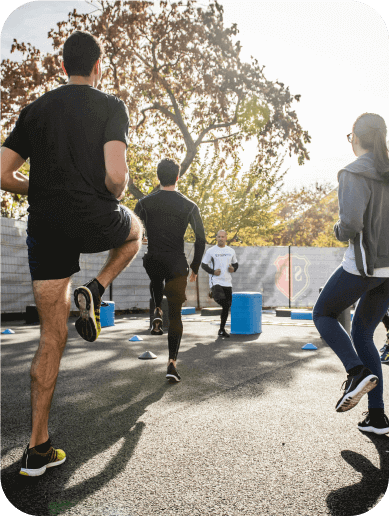 Group of people exercising outdoors with caution for Myasthenia Gravis
